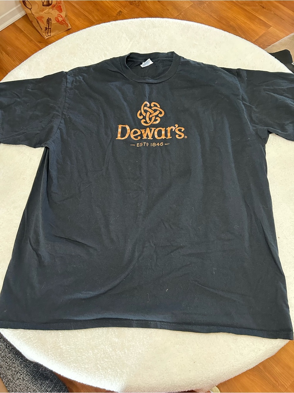 Source Unknown Black Tee with Amber Dewar's Logo